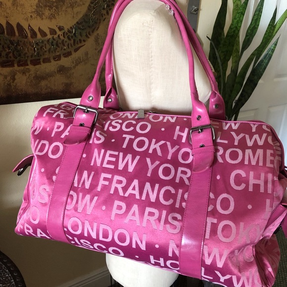 Bueno Handbags - Roomy carry on pink duffle bag Bueno side pockets